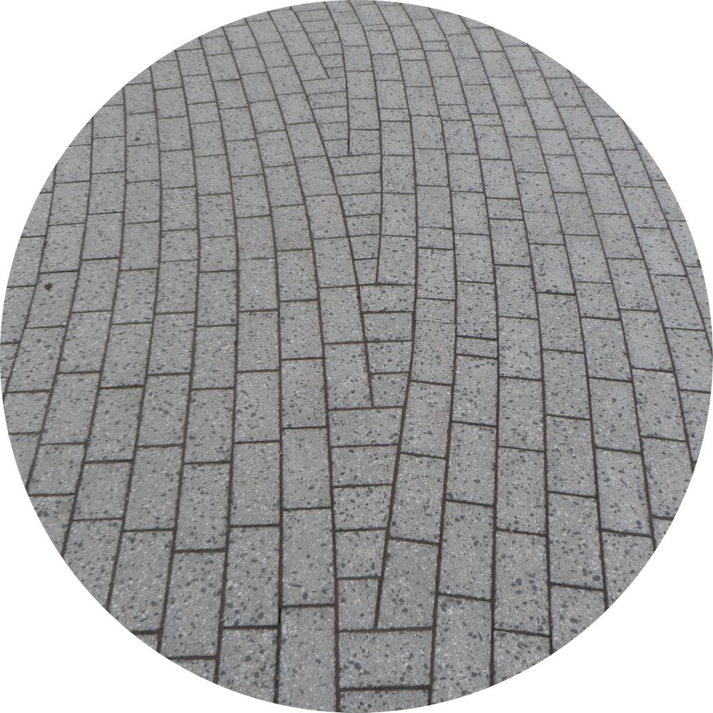 Ein Bild von einer Pflasterflaeche
							